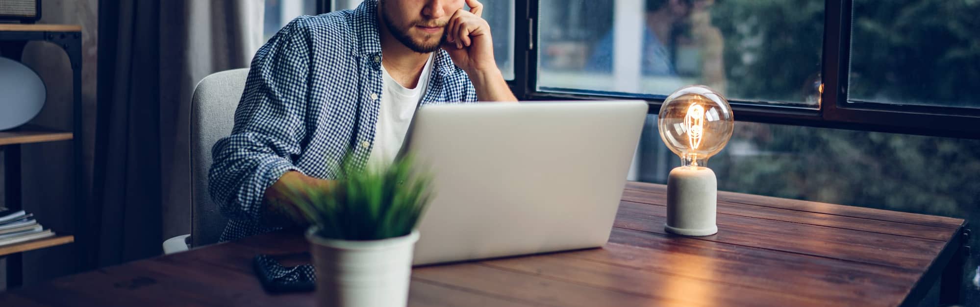 Close-up image of a person typing on a laptop keyboard, symbolizing the act of creating a blog post and highlighting the importance of blogging in today's digital age.